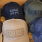 FORTIS PERFORMANCE CLOTHING FAMOUS TRUCKERS CAPS INC NEW DESIGNS